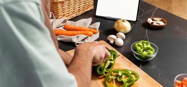 Person cutting vegetables